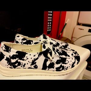 Cow print loafers